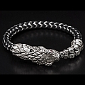 FULL CIRCLE STERLING SILVER DRAGONHEAD BRACELET WITH TOPAZ AND BRAIDED RUBBER AND STAINLESS CORD